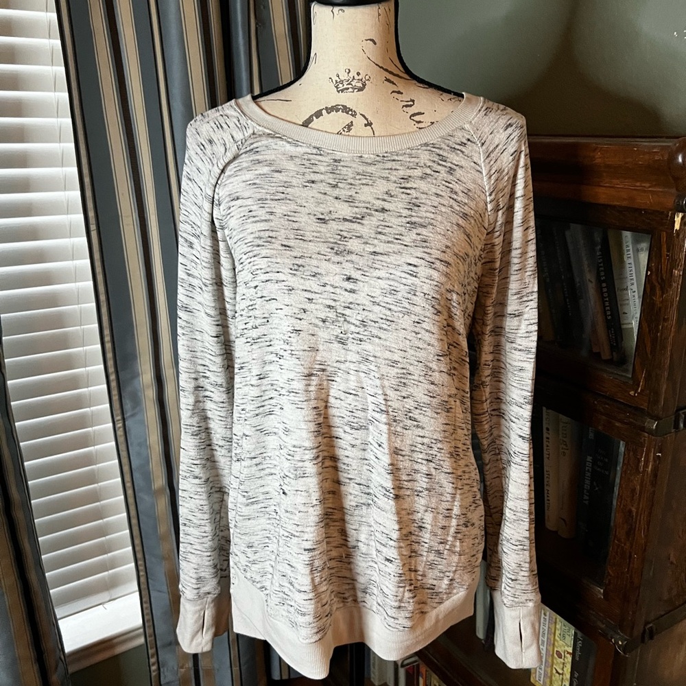 Soft lightweight long sleeve top with thumb holes!